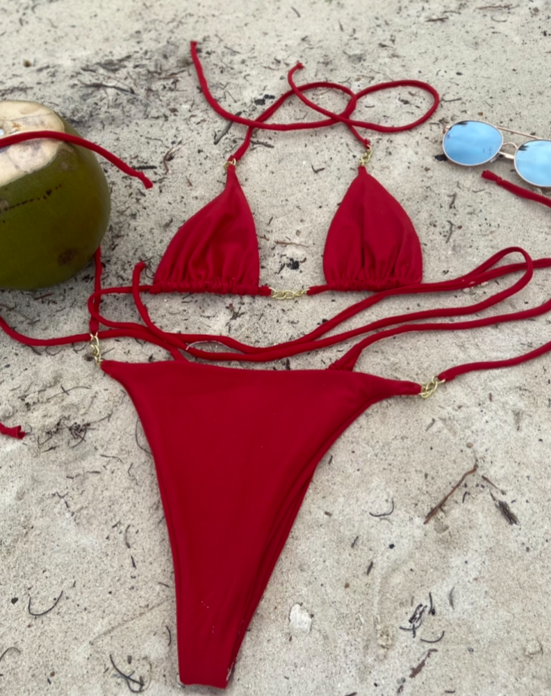 red bikini, gold links, two-piece, spaghetti strap